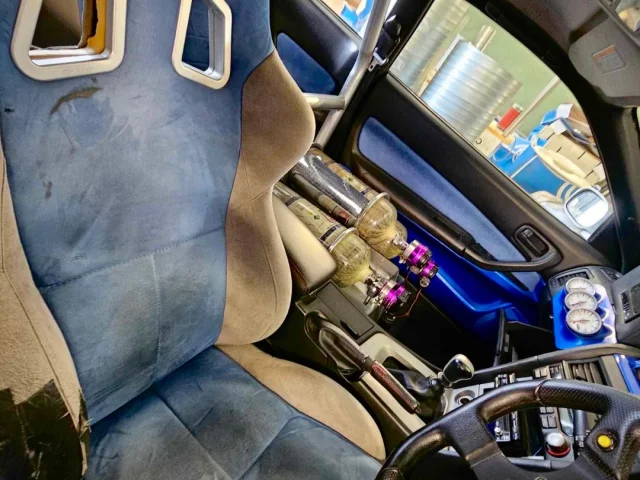 nissan-skyline-r34-gtr-sparco-schalensitz-interieur-detail